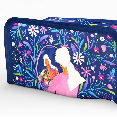Makeup bag with floral design and woman with tiger illustration by Barbara Tamilin