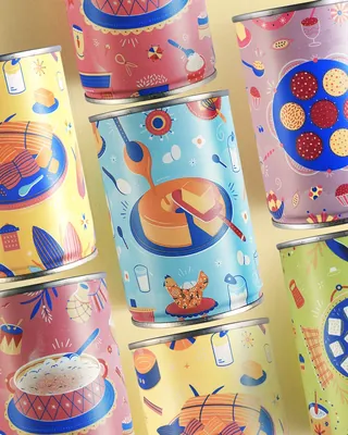Colorful food-themed decorative cans with artistic illustrations by Barbara Tamilin