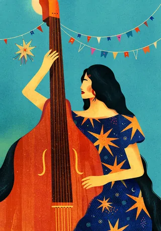 Woman playing a large string instrument with colorful flags in background