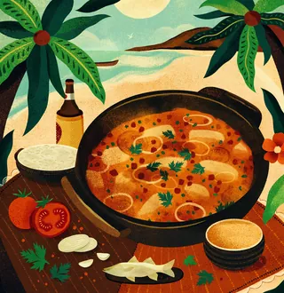Seafood stew in a pot with tomatoes, rice, and tropical plants