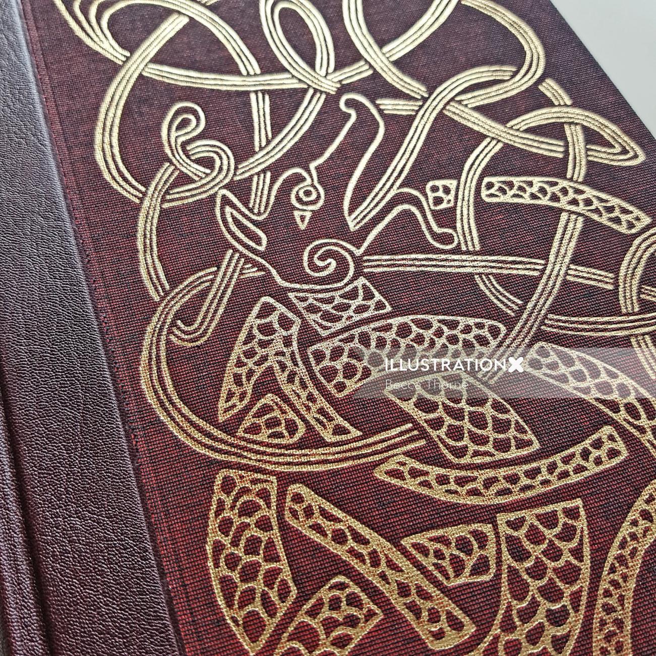 The Folio Society の Seamus Heaney の Beowulf の表紙で、金箔をはったリノカットのイラストが示されています