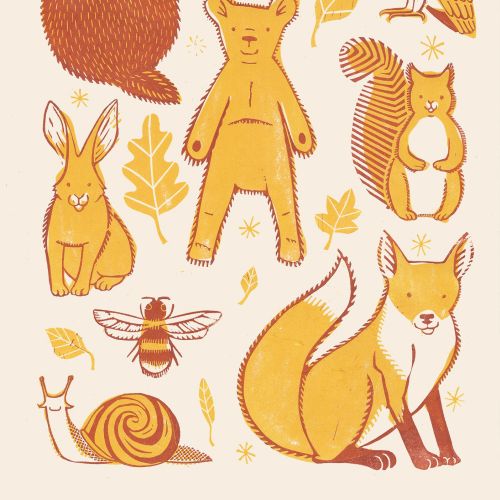a cute linocut print of woodland animals in autumnal colours