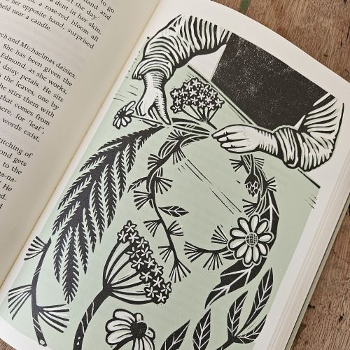 Linocut illustration of hands creating a flower crown by Becca Thorne
