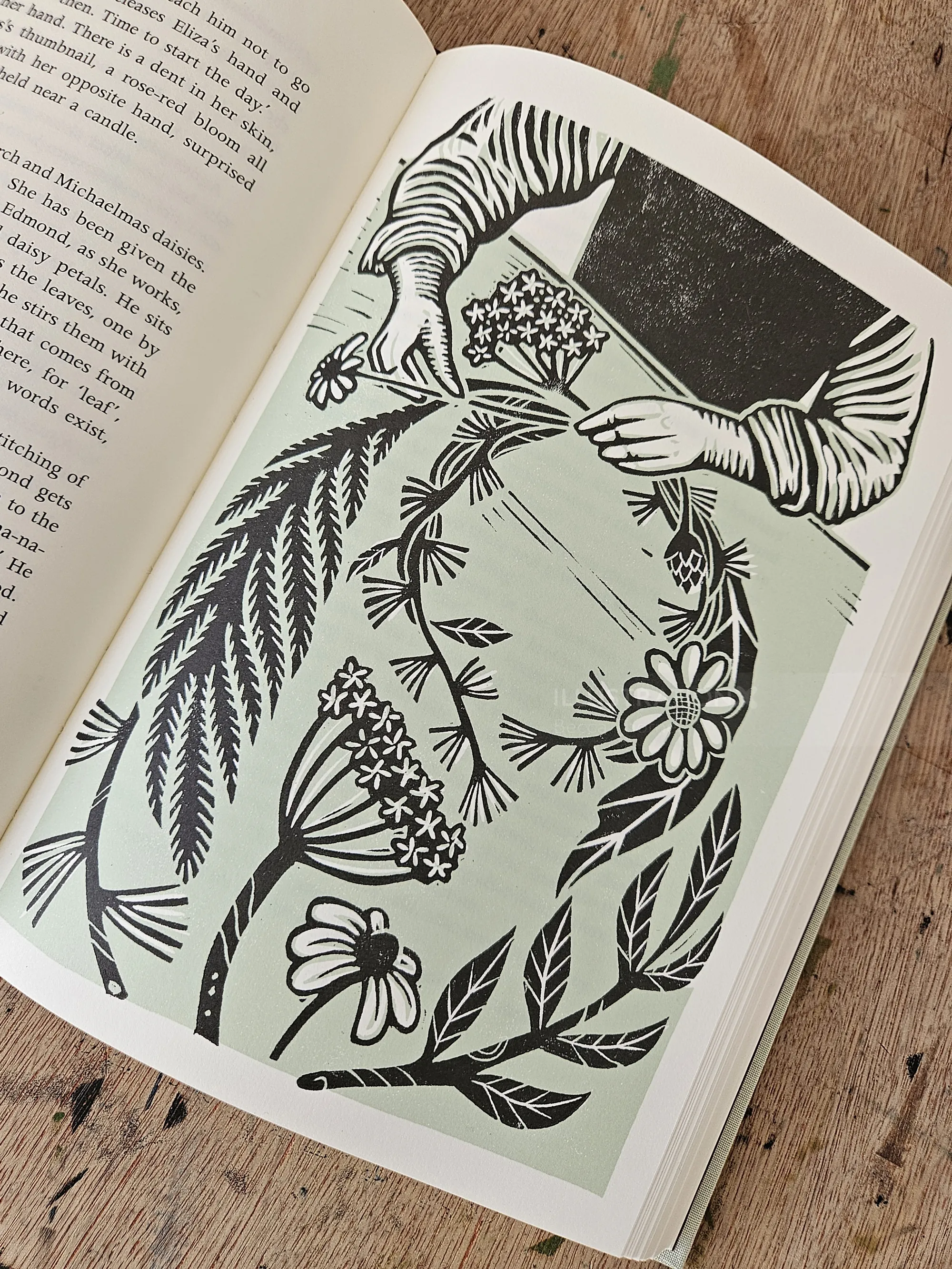 Linocut illustration of hands creating a flower crown by Becca Thorne