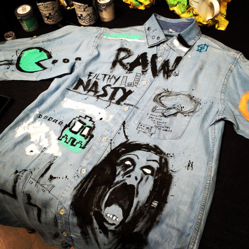 Live event drawing raw nasty on shirt

