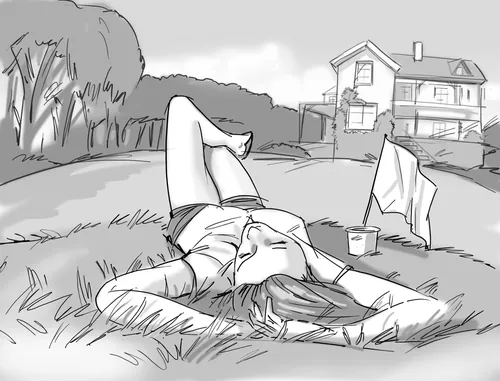 Person lying on grass near house under trees by Björn von Schlippe
