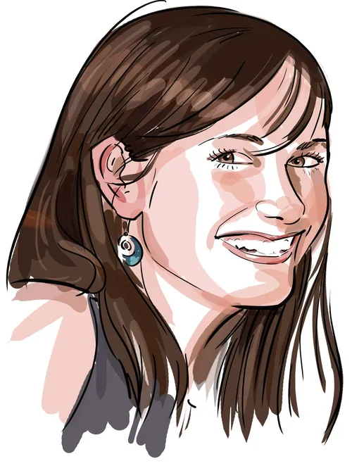 Portrait of smiling woman with brown hair by Björn von Schlippe