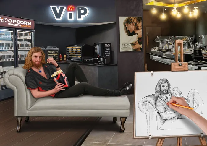 Man relaxing on chaise lounge while artist draws his portrait in cinema