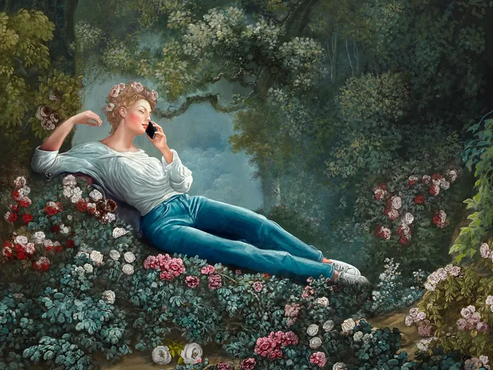 Woman lying among blooming flowers in a peaceful garden