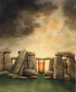 Stonehenge monument during sunset with glowing orange light, by Bob Venables