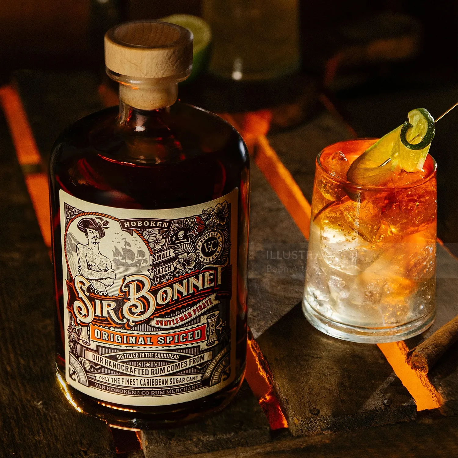 Bottle of Sir Bonnet original spiced rum next to a cocktail glass with lime garnish