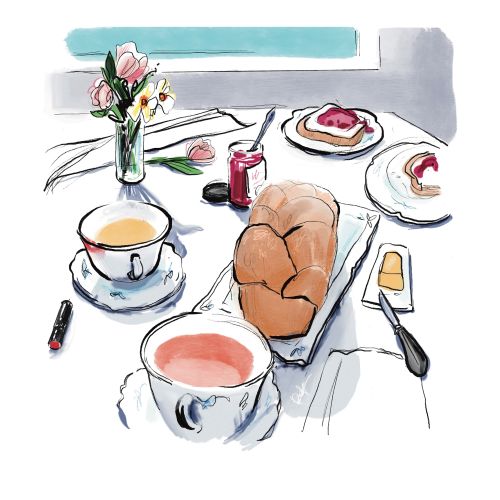 Cozy tea setting with bread, jam, two cups, and flowers by Briana Kranz
