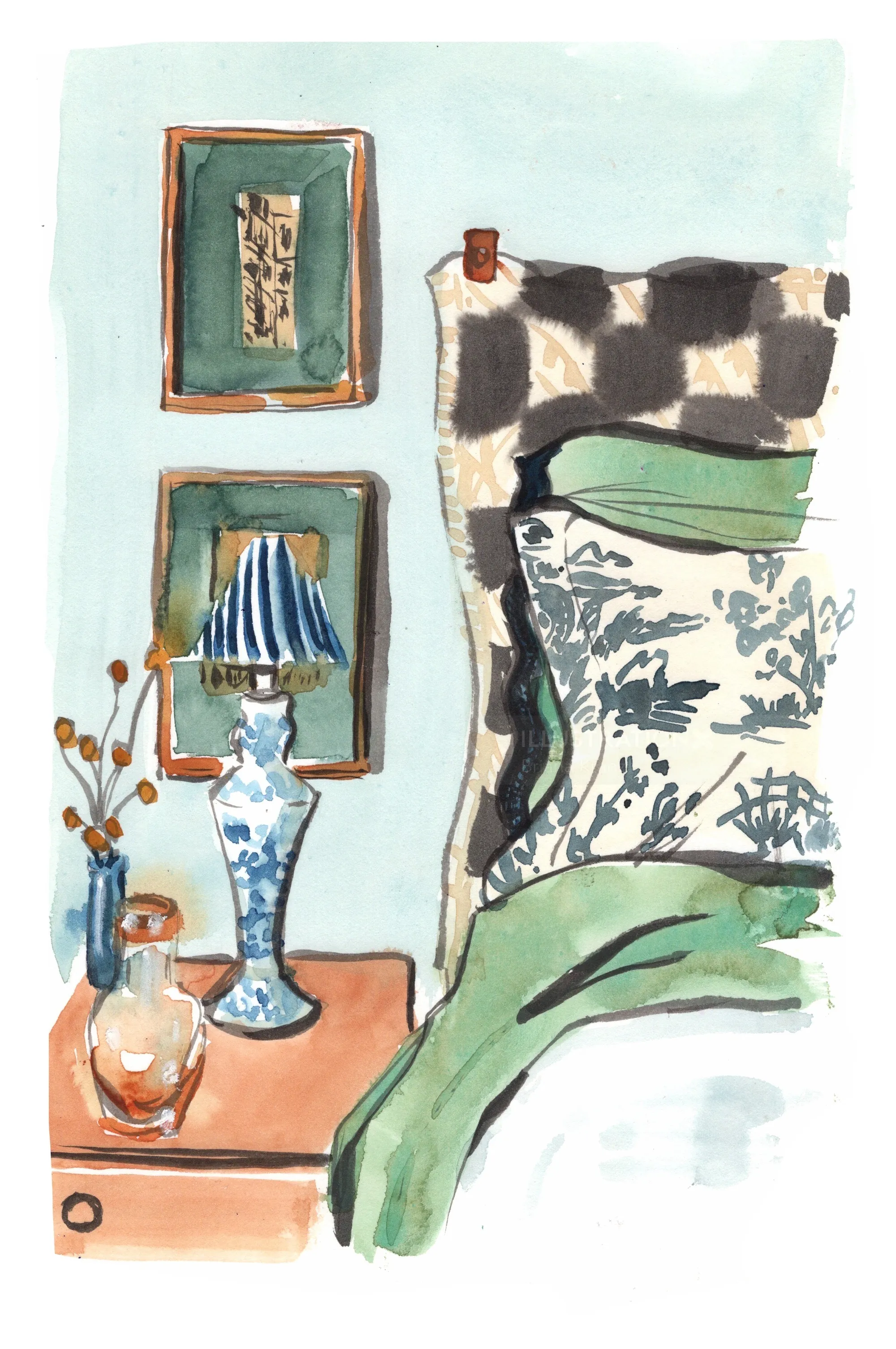 Coin chambre avec coussin décoratif, lampe bleue et tableaux encadrés