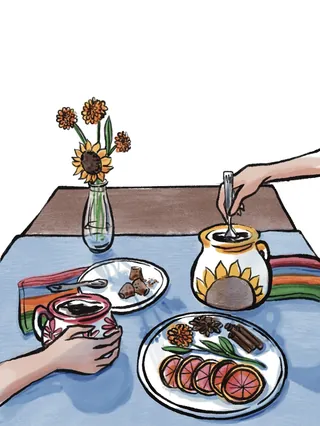 Two hands sharing coffee and breakfast with vase of flowers