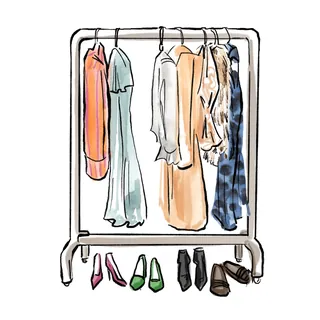 Clothing rack with dresses and shoes by Briana Kranz