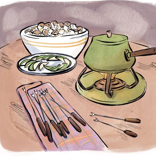 Fondue pot, marshmallows, apple slices, and forks by Briana Kranz