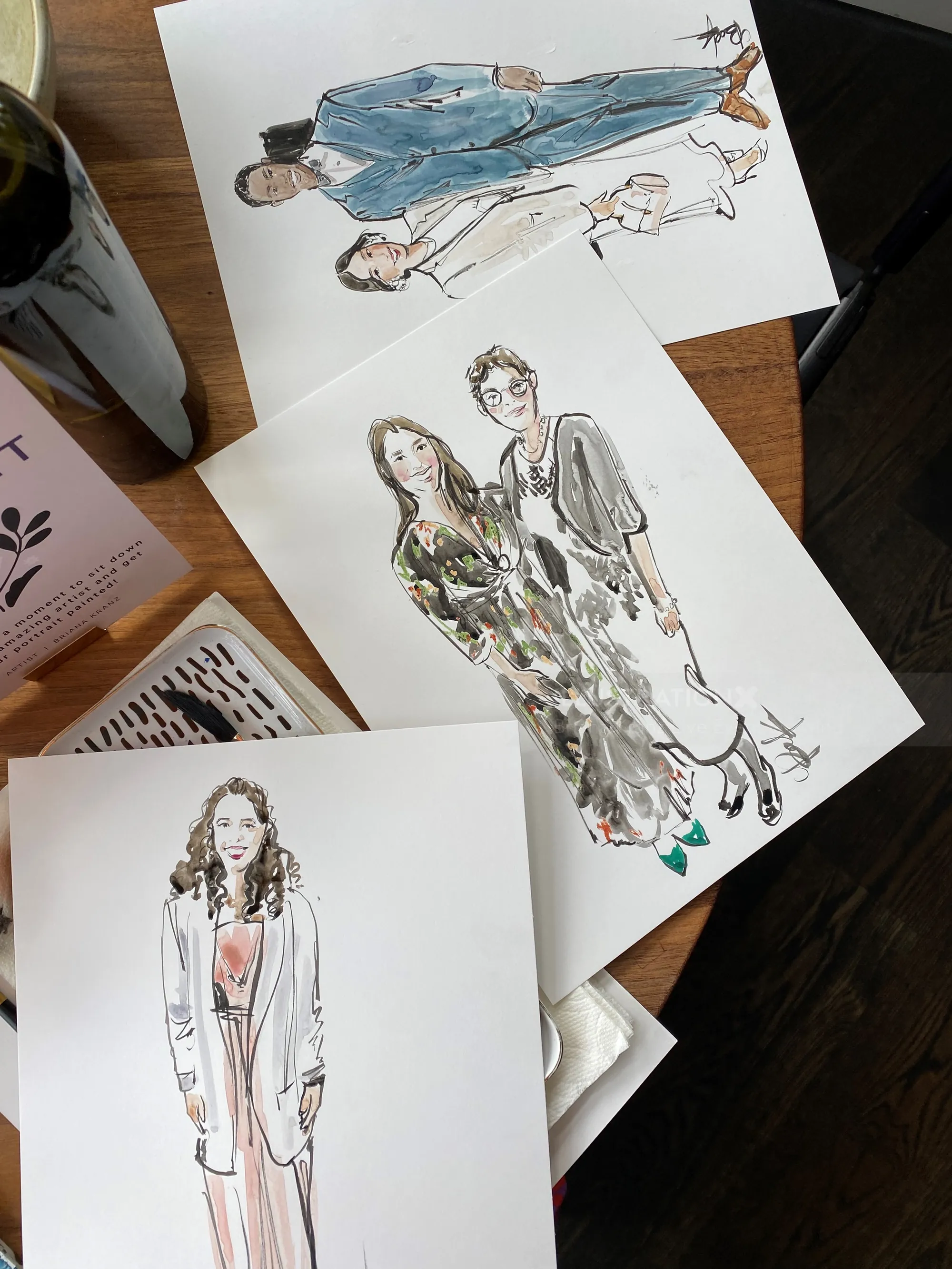 Fashion illustration sketches on a table by Briana Kranz