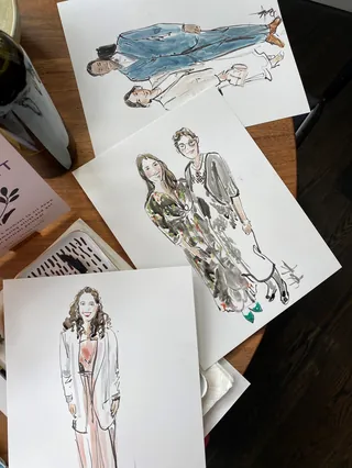Fashion illustration sketches on a table by Briana Kranz