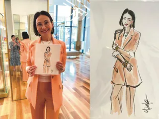 Woman in peach suit holding a fashion sketch at Bulgari event