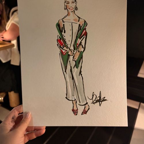 Briana Kranz Live Event Drawing of a woman in a green and red outfit