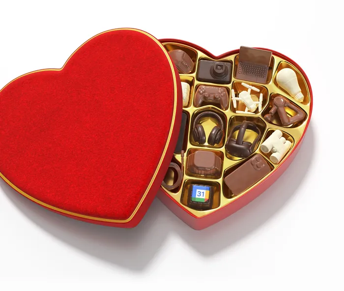 Heart-shaped box of assorted chocolates with red lid