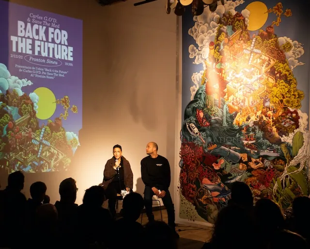 Two speakers present 'Back for the Future' artwork at event by Carles Garcia O'Dowd