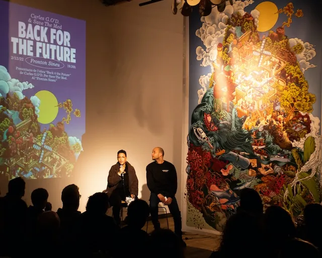 Two speakers present 'Back for the Future' artwork at event by Carles Garcia O'Dowd
