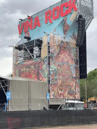 Viña Rock outdoor stage with large sign and sound equipment
