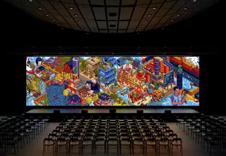 Colorful pixel art mural in dark gallery with empty chairs