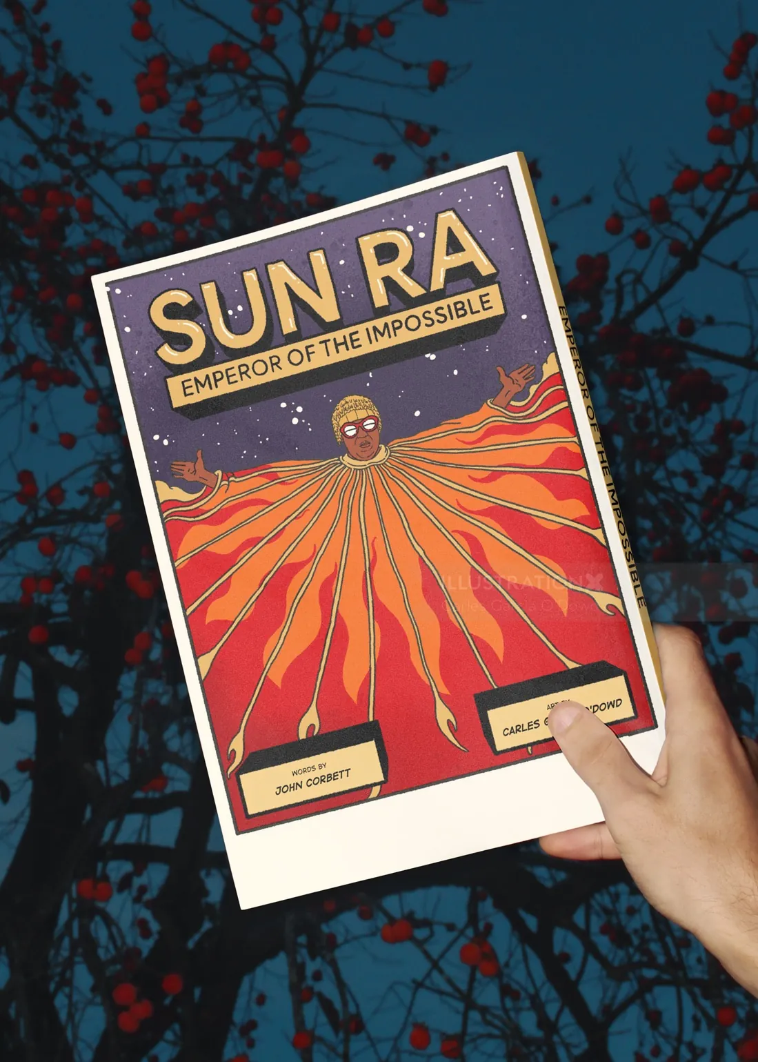 Hand holds Sun Ra Emperor of the Impossible poster with fiery design