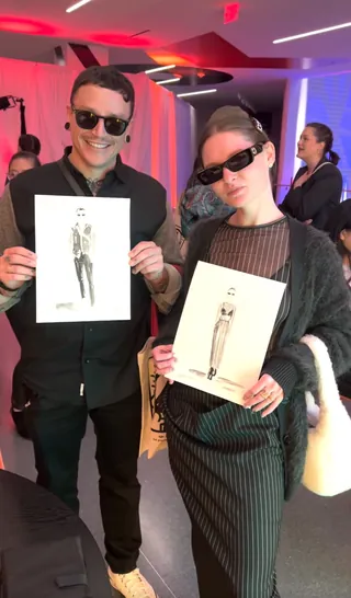 Visitors displaying their collection of sketches