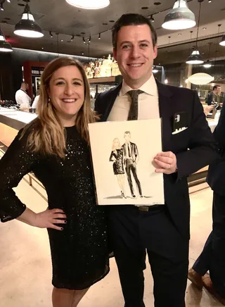 Guest presenting a live sketch created during the event