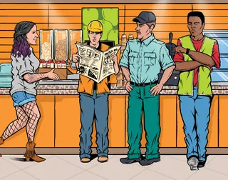 Four workers in various uniforms standing and reading a newspaper indoors.