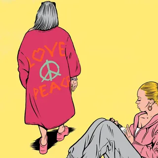 Two women, one in pink coat with love and peace symbols, yellow background