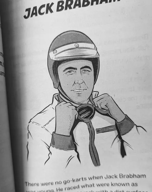 Portrait of Jack Brabham wearing racing helmet and suit