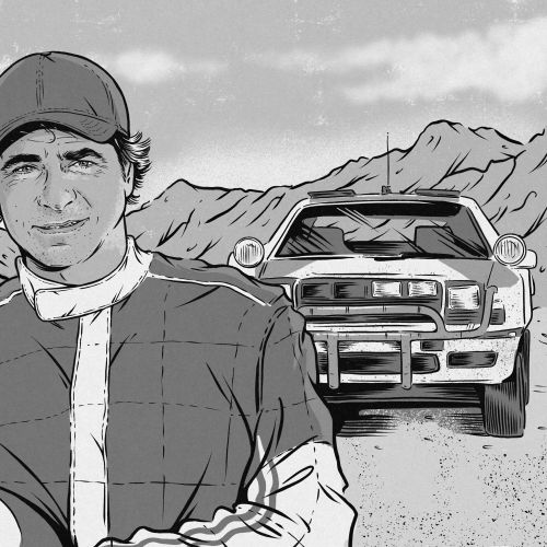 Race car driver holding helmet with off-road vehicle and mountains by Cat Sims