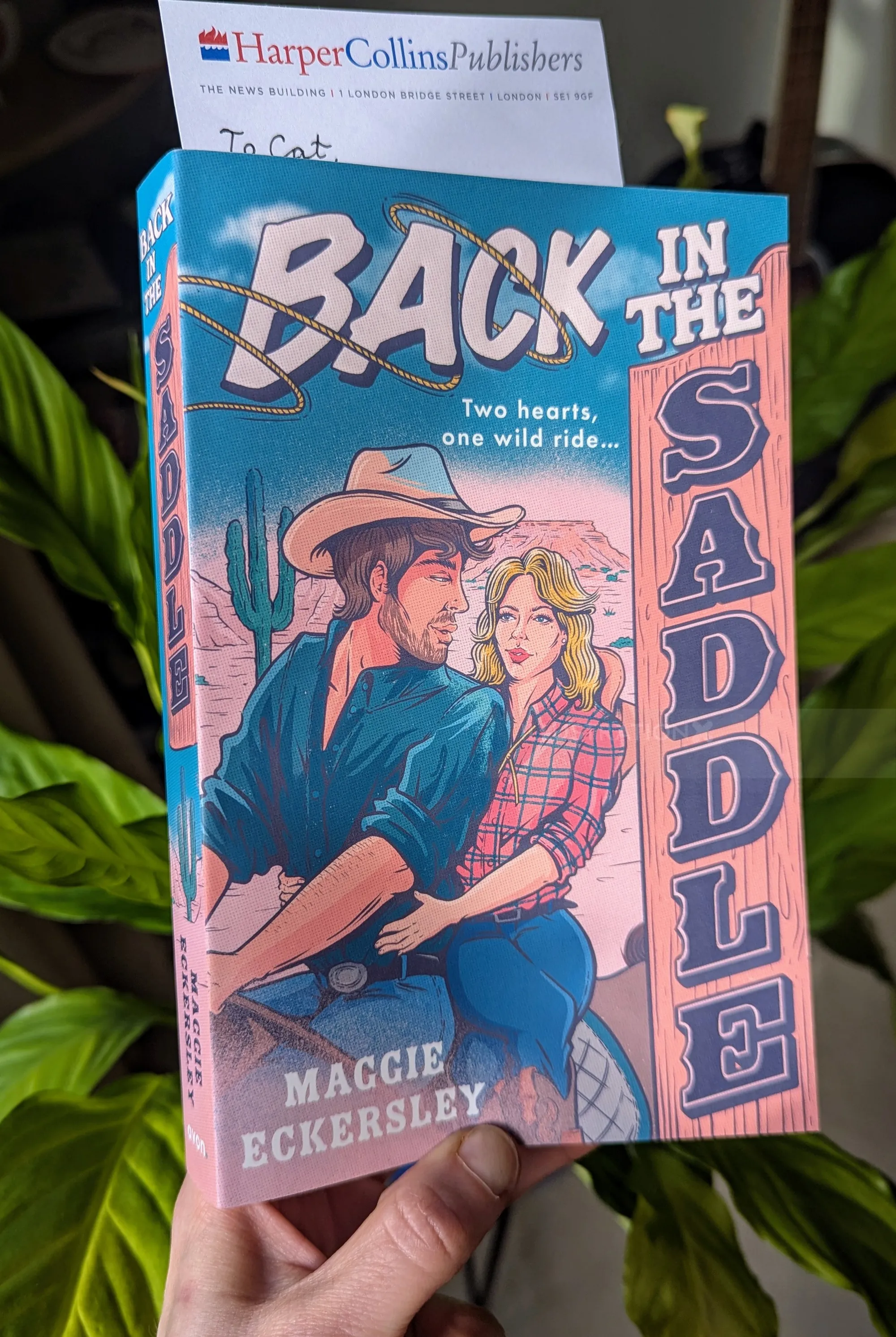 Book cover of Back in the Saddle by Maggie Eckersley, cowboy and woman illustration by Cat Sims
