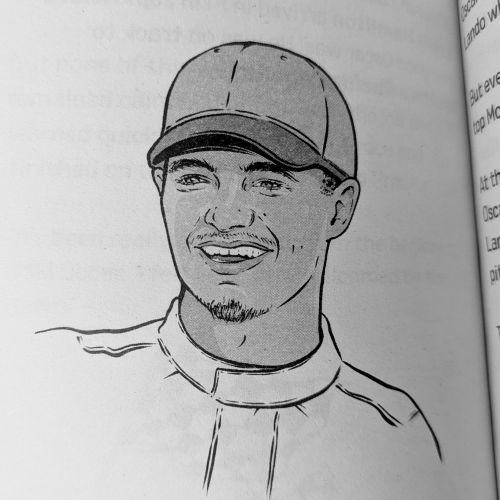 Black and white portrait of Lando Norris wearing a cap by Cat Sims