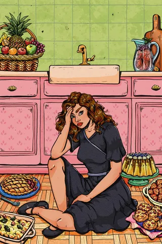 Woman sitting on kitchen floor surrounded by desserts and fruits