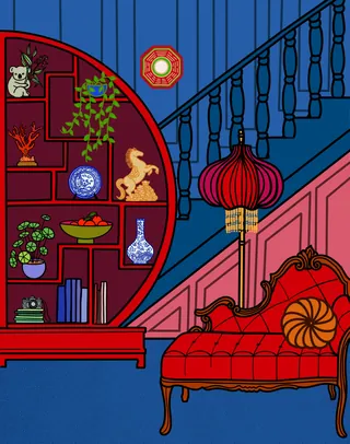 Red chaise lounge and decorative shelf with plants and figurines under staircase