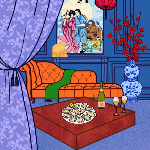 Living room with orange sofa, red lanterns, and a decorated table