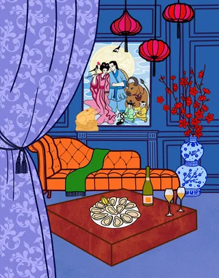 Living room with orange sofa, red lanterns, and a decorated table