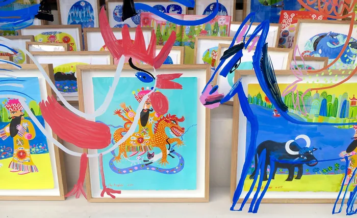 Bright and colorful animal paintings including rooster and blue horse