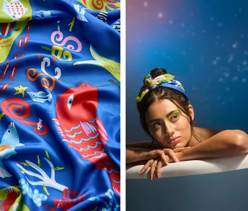 Woman wearing colorful sea-themed headscarf leaning on bathtub edge