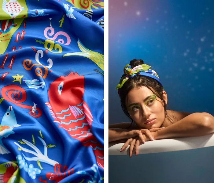 Woman wearing colorful sea-themed headscarf leaning on bathtub edge