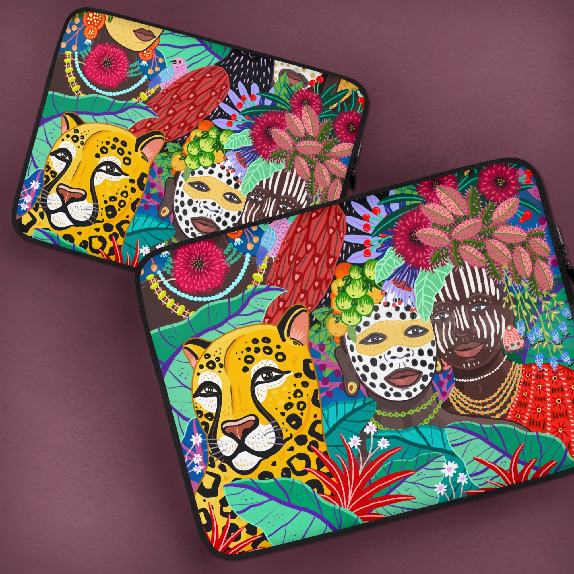 Tribal graphic design laptop sleeves with tropical foliage