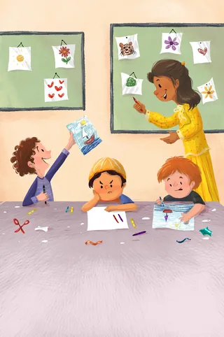 Teacher helping kids with paper crafts in classroom