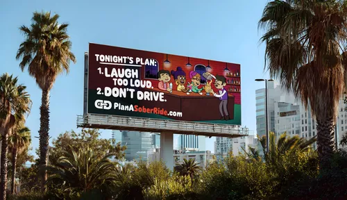 Daniel Sulzberg photograph of a sober ride billboard among palm trees
