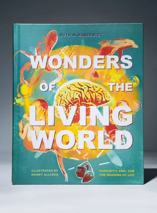 Illustrated cover for "Wonders of the Living World" book