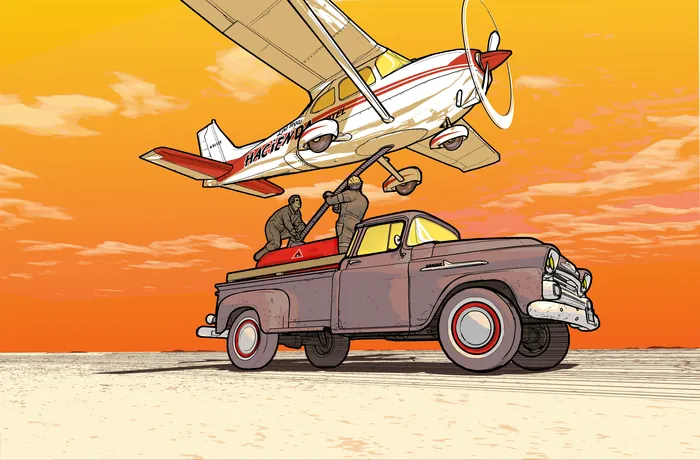 Small plane flying over vintage pickup truck at sunset by Davi Augusto